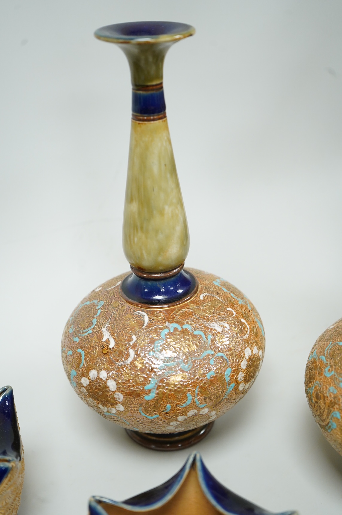A pair of Royal Doulton Slater’s patent vases, 26cm high and pots and a jug together with a collection of miniature stoneware pots jugs and a pair of peppers